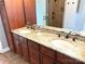 Elegant bathroom with a double sink vanity, granite counters, and a large framed mirror at 141 Weathers Creek Rd, Troutman, NC 28166