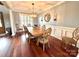 Formal dining room boasts hardwood floors, updated lighting, wainscoting at 141 Weathers Creek Rd, Troutman, NC 28166