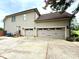 Spacious three-car garage with ample parking space and convenient access to the home at 141 Weathers Creek Rd, Troutman, NC 28166