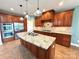 Gourmet kitchen features custom cabinets, granite countertops, and stainless appliances at 141 Weathers Creek Rd, Troutman, NC 28166