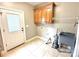 Laundry room featuring a stainless steel sink, and ample storage at 141 Weathers Creek Rd, Troutman, NC 28166