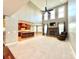 Open-concept living room, kitchen, and fireplace create a great space for entertaining at 141 Weathers Creek Rd, Troutman, NC 28166