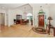 Spacious entryway and formal dining room featuring hardwood floors and elegant lighting at 14831 Charterhouse Ln, Huntersville, NC 28078