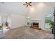 Neutral living room featuring a fireplace and vaulted ceilings at 14831 Charterhouse Ln, Huntersville, NC 28078
