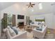 Inviting living room with vaulted ceilings, fireplace, and comfortable seating at 14831 Charterhouse Ln, Huntersville, NC 28078