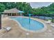 A community splash pad offers a refreshing aquatic experience with ample lounging space and fenced in tennis court at 14831 Charterhouse Ln, Huntersville, NC 28078