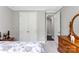 Bedroom with double door closet, dresser and neutral paint at 15416 Oleander Dr, Charlotte, NC 28278