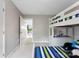 Upstairs bedroom with bunkbeds, natural light, and close proximity to an outdoor balcony at 15416 Oleander Dr, Charlotte, NC 28278