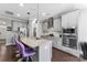 Modern kitchen featuring stainless steel appliances, granite countertops, and a stylish island at 15416 Oleander Dr, Charlotte, NC 28278