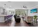 Open concept living room with hardwood floors and an abundance of natural light at 15416 Oleander Dr, Charlotte, NC 28278