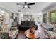 Bright living room seamlessly connects to the kitchen, creating an inviting space at 15416 Oleander Dr, Charlotte, NC 28278