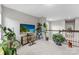 Loft with plants, TV and staircase at 15416 Oleander Dr, Charlotte, NC 28278