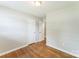 Simple bedroom with hardwood floors and neutral walls, providing a blank canvas for personalization and comfort at 1631 Vancouver Dr, Charlotte, NC 28213