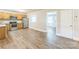 Well-lit kitchen showcases stainless steel appliances and an open floorplan leading to other rooms at 1631 Vancouver Dr, Charlotte, NC 28213