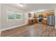 Well-lit kitchen with wood cabinets and stainless steel appliances, creating a functional and stylish cooking area at 1631 Vancouver Dr, Charlotte, NC 28213