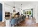 Modern kitchen with a large island, stainless steel appliances, and an adjacent dining area at 1940 Westerhill Dr, Fort Mill, SC 29708