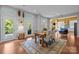 Open-concept dining area with wood table, four chairs, and access to an outdoor deck at 2009 Waterbury Ln, Waxhaw, NC 28173