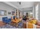 Bright and spacious living room with hardwood floors, elegant furnishings, and plenty of natural light at 2009 Waterbury Ln, Waxhaw, NC 28173
