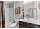 Bathroom features a shower-tub combo, single vanity, and modern lighting at 2010 Brightflower Ln, York, SC 29745