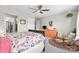 Bright bedroom with two windows, a patterned rug, chair and decor at 2010 Brightflower Ln, York, SC 29745