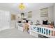 Stylish bedroom with matching twin beds, neutral walls and access to a bath at 2010 Brightflower Ln, York, SC 29745