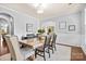 Formal dining room with elegant wainscoting, stylish table setting, and ample room at 2010 Brightflower Ln, York, SC 29745