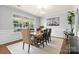 Formal dining room featuring elegant wainscoting, stylish furnishings, and ample natural light at 2010 Brightflower Ln, York, SC 29745