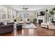 Cozy living room with modern furnishings, fireplace, and ample natural light at 2010 Brightflower Ln, York, SC 29745