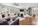 Inviting living room featuring a fireplace, large windows, and comfortable seating at 2010 Brightflower Ln, York, SC 29745