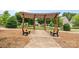 Neighborhood park featuring benches under a pergola, creating a tranquil outdoor setting at 2010 Brightflower Ln, York, SC 29745
