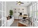 Bright office with a modern desk, a comfortable sofa, and natural light at 2010 Brightflower Ln, York, SC 29745
