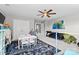 Large playroom with neutral paint, plush carpet, a ceiling fan, and access to the upstairs hallway at 2010 Brightflower Ln, York, SC 29745
