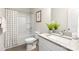 Bathroom featuring granite countertops and a shower-tub combo at 212 Queens Ct, Gastonia, NC 28052
