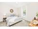 Bright bedroom with carpet and neutral decor at 212 Queens Ct, Gastonia, NC 28052