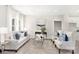 Comfortable living area decorated in neutral tones with plush seating and plenty of natural light at 212 Queens Ct, Gastonia, NC 28052