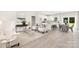 Spacious living area showcasing an open layout that flows into the kitchen and dining spaces at 212 Queens Ct, Gastonia, NC 28052