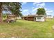 A large and spacious backyard offers opportunities for outdoor activities and gardening at 2210 Joes Lake Rd, Shelby, NC 28152