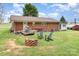 The backyard has space for outdoor dining and recreation, perfect for entertaining at 2210 Joes Lake Rd, Shelby, NC 28152