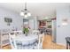 Charming dining area leading to the kitchen, featuring a table and chairs at 2210 Joes Lake Rd, Shelby, NC 28152