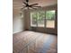 Bright bedroom with large windows, offering natural light and a serene view of the surrounding landscape at 2589 Polo Ln, Maiden, NC 28650