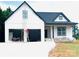New construction home featuring white siding, dark roof, covered porch and an attached two car garage at 2589 Polo Ln, Maiden, NC 28650