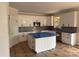 New kitchen featuring an island, white cabinets, stainless steel appliances, and modern fixtures for a stylish cooking space at 2589 Polo Ln, Maiden, NC 28650