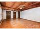 Spacious bedroom with hardwood floors, wood ceilings, and natural light at 2709 Blythe Rd, Waxhaw, NC 28173