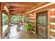 Welcoming covered porch with a swing and inviting front door at 2709 Blythe Rd, Waxhaw, NC 28173