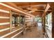 Relaxing covered porch with comfortable seating and views of nature at 2709 Blythe Rd, Waxhaw, NC 28173