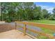 Private backyard features a new wooden deck with an idyllic natural setting at 2980 N Church St, Claremont, NC 28610