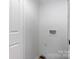Functional laundry room featuring washer/dryer hookups and ample space at 2980 N Church St, Claremont, NC 28610