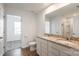 Bright bathroom featuring a double sink vanity with granite countertop, and a separate shower at 3073 Langhorne Sw Ave, Concord, NC 28027