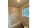 Bathroom featuring a shower and natural lighting at 317 Heilig Ave, Salisbury, NC 28144