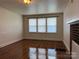 Spacious room with hardwood floors, neutral paint, and fireplace at 317 Heilig Ave, Salisbury, NC 28144